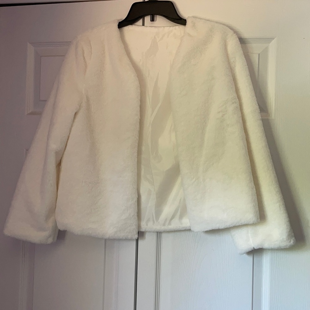 White faux fur coat